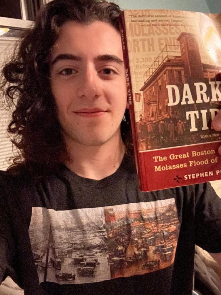 Ezra Weintraub holding Dark Tide